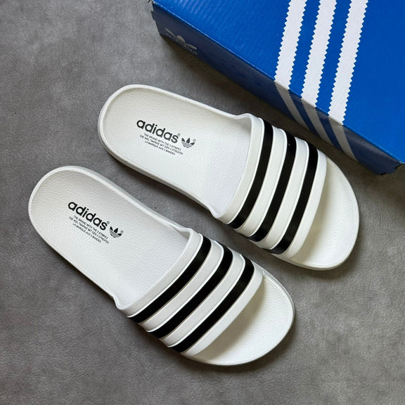 CHANCLAS ADIDAS ADILETTE BLANCA - NEGRAS