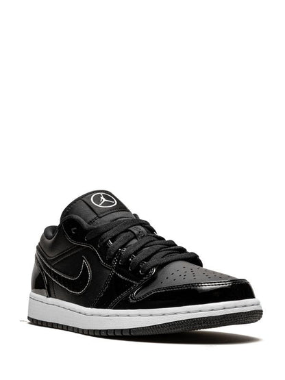 Jordan Retro 1 Low Charol – Negro / Blanco
