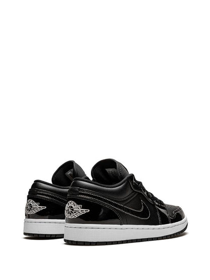 Jordan Retro 1 Low Charol – Negro / Blanco