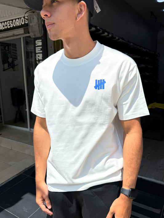 CAMISETA UNDEFEATED BLANCA